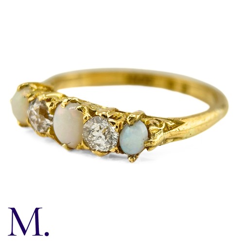 114 - An Antique Opal and Diamond Ring

The 18ct yellow gold ring is set with three oval opals with good c... 