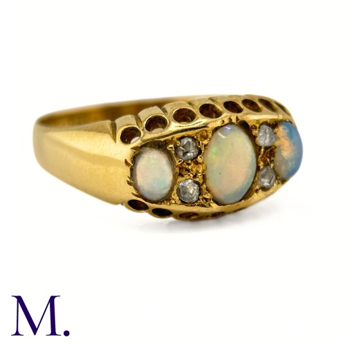 116 - An Antique Opal and Diamond Ring

The 18ct yellow gold ring is set with three good colour opals with... 