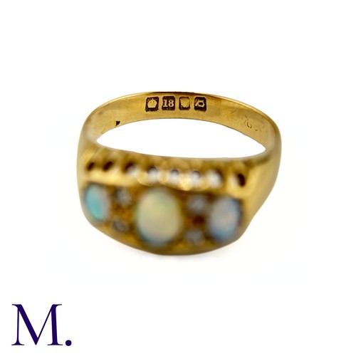 116 - An Antique Opal and Diamond Ring

The 18ct yellow gold ring is set with three good colour opals with... 