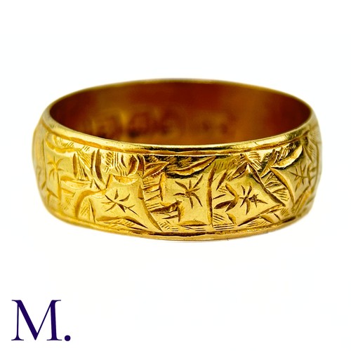 44 - An Antique Gold Mizpah Band

The antique 18ct yellow gold band is engraved to the rear and embossed ... 