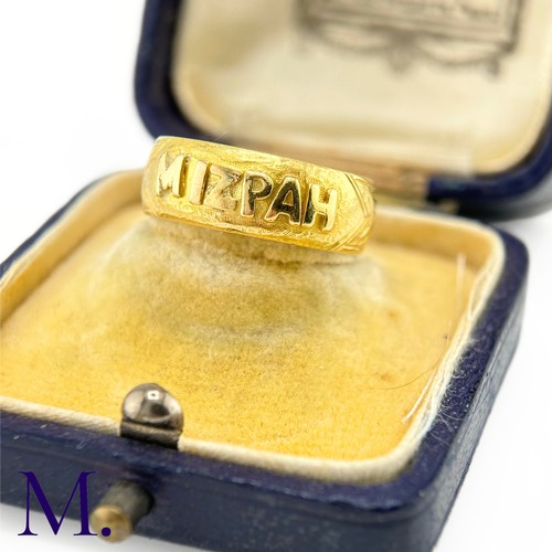 44 - An Antique Gold Mizpah Band

The antique 18ct yellow gold band is engraved to the rear and embossed ... 