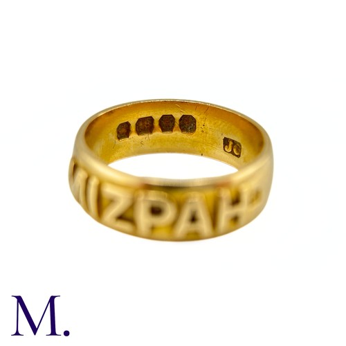 34 - An Antique Mizpah Ring

The 18ct yellow gold band has the word 'mizpah' embossed to the front.

Weig... 