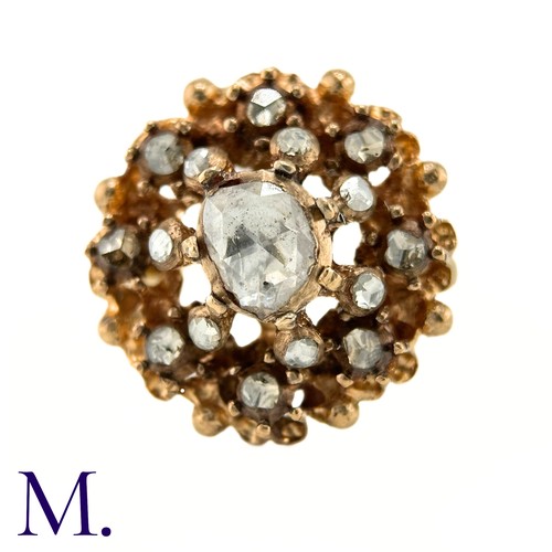 30 - An Antique Rose Diamond Cluster Ring

The yellow gold ring is set with rose diamonds, the largest of... 