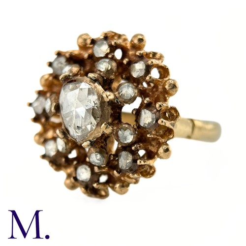 30 - An Antique Rose Diamond Cluster Ring

The yellow gold ring is set with rose diamonds, the largest of... 