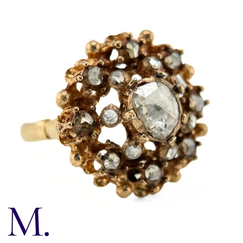 30 - An Antique Rose Diamond Cluster Ring

The yellow gold ring is set with rose diamonds, the largest of... 