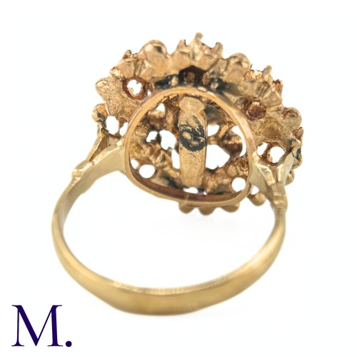 30 - An Antique Rose Diamond Cluster Ring

The yellow gold ring is set with rose diamonds, the largest of... 