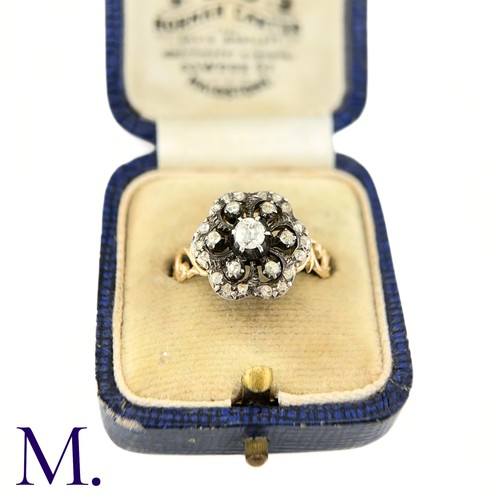 2 - An Antique Rose Diamond Cluster Ring

The ring is set with a 0.20ct old cut diamond to the centre wi... 