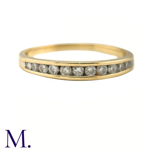 8 - A Diamond Half Eternity Band

The yellow gold band is set with eleven small diamonds amounting to ap... 