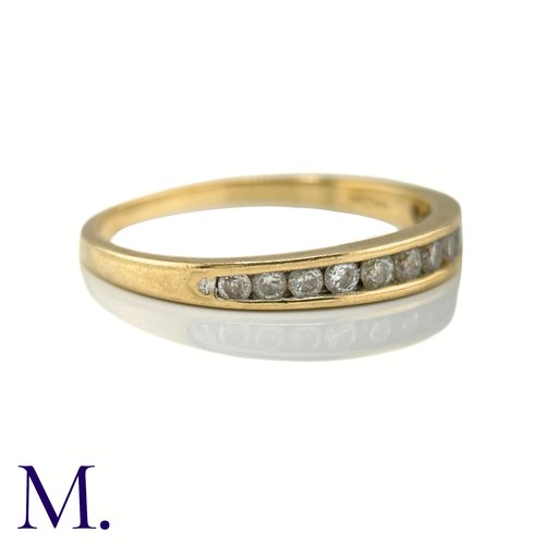 8 - A Diamond Half Eternity Band

The yellow gold band is set with eleven small diamonds amounting to ap... 