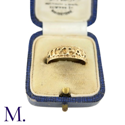 29 - A 9ct Gold Mizpah Ring

The 9ct yellow gold ring is embossed to the front with the word 'mizpah'.

W... 