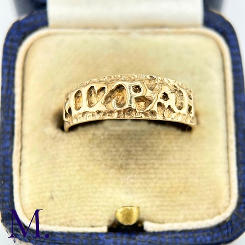 29 - A 9ct Gold Mizpah Ring

The 9ct yellow gold ring is embossed to the front with the word 'mizpah'.

W... 