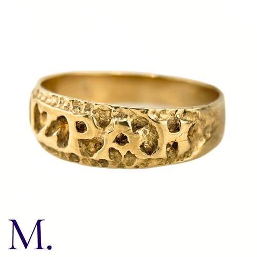 29 - A 9ct Gold Mizpah Ring

The 9ct yellow gold ring is embossed to the front with the word 'mizpah'.

W... 