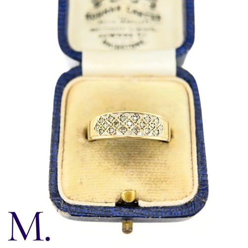 7 - NO RESERVE - A Diamond-Set Wide Band

The 9ct yellow gold band is set with nineteen small diamonds.
... 