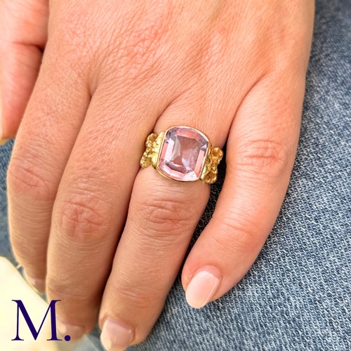 24 - An Art Nouveau Amethyst Ring (Spanish)

The yellow gold ring originates from the Catalonia area in S... 