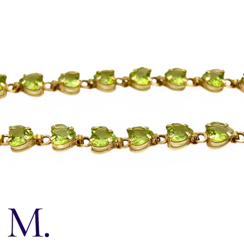 23 - Vintage Peridot and Gold Bracelet (10ct Gold)

The 10ct yellow gold bracelet is made up of twenty-on... 