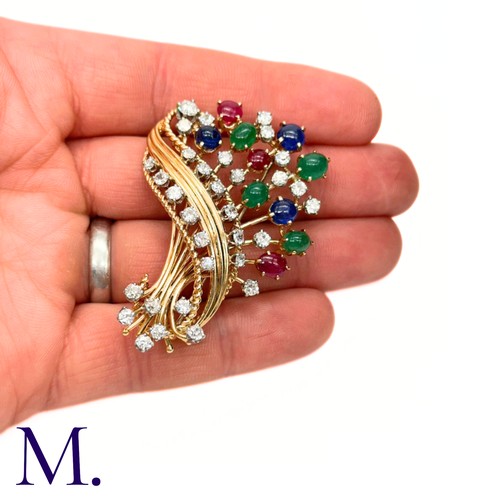 84 - Retro Tutti Frutti Diamond and Gemstone Brooch

This 1950s Tutti Frutti brooch is set with  ruby, em... 