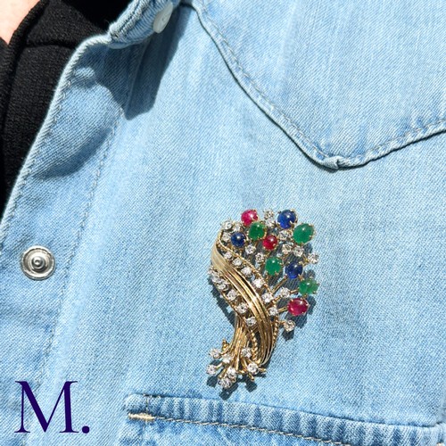 84 - Retro Tutti Frutti Diamond and Gemstone Brooch

This 1950s Tutti Frutti brooch is set with  ruby, em... 