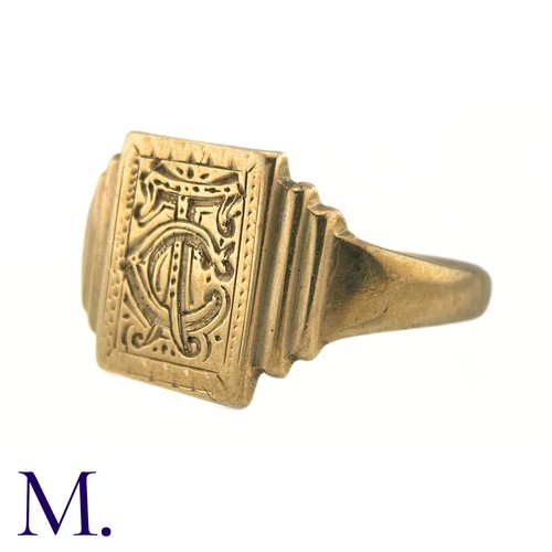 74 - An Art Deco Engraved Signet Ring

The 9ct yellow gold ring has a rectangular face with engraved mono... 