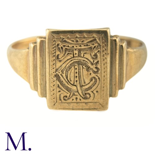 74 - An Art Deco Engraved Signet Ring

The 9ct yellow gold ring has a rectangular face with engraved mono... 