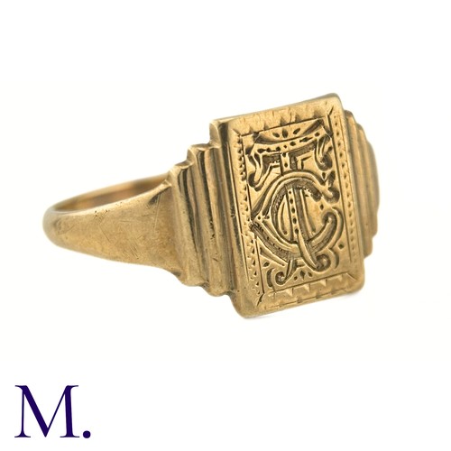 74 - An Art Deco Engraved Signet Ring

The 9ct yellow gold ring has a rectangular face with engraved mono... 