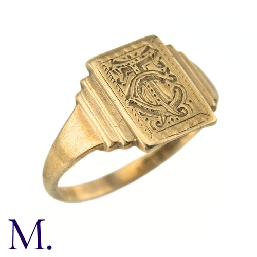 74 - An Art Deco Engraved Signet Ring

The 9ct yellow gold ring has a rectangular face with engraved mono... 