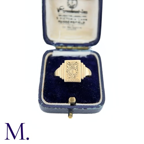 74 - An Art Deco Engraved Signet Ring

The 9ct yellow gold ring has a rectangular face with engraved mono... 