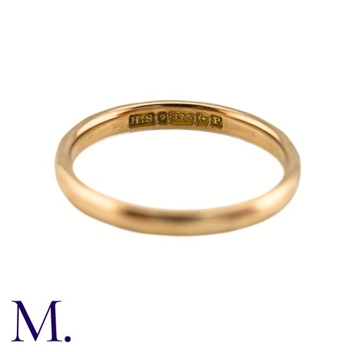 5 - A Faceted 9ct Rose Gold Band

The band is marked for 9ct gold and dates to 1939.

Weight: 1.8g
Size:... 