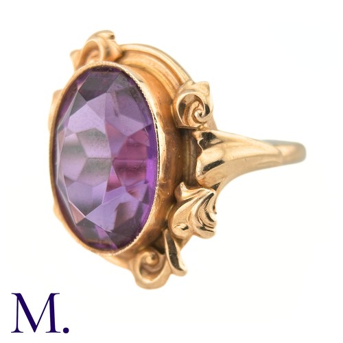 15 - A Russian Purple Sapphire Ring

The 14ct rose gold ring, with Russian hallmarks, is set with a large... 