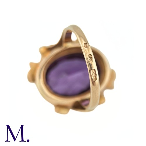 15 - A Russian Purple Sapphire Ring

The 14ct rose gold ring, with Russian hallmarks, is set with a large... 