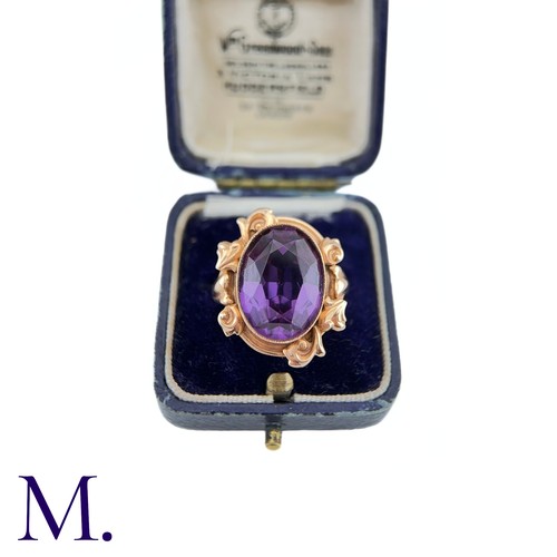 15 - A Russian Purple Sapphire Ring

The 14ct rose gold ring, with Russian hallmarks, is set with a large... 