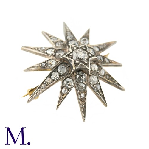 53 - A Victorian Diamond Star Brooch

The 19th Century star brooch is set with old cut diamonds, the cent... 