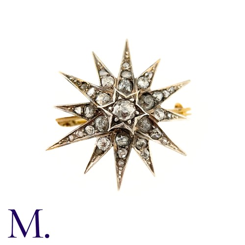 53 - A Victorian Diamond Star Brooch

The 19th Century star brooch is set with old cut diamonds, the cent... 