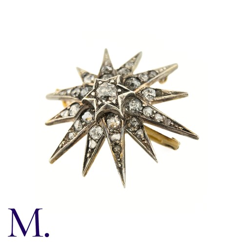 53 - A Victorian Diamond Star Brooch

The 19th Century star brooch is set with old cut diamonds, the cent... 