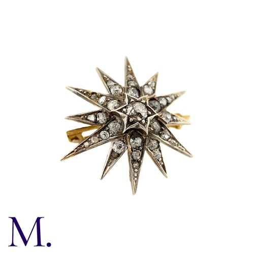 53 - A Victorian Diamond Star Brooch

The 19th Century star brooch is set with old cut diamonds, the cent... 