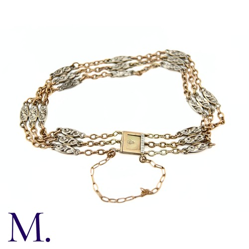 64 - A Two-Colour Gold Bracelet

The two-colour gold bracelet tests as 9ct gold.  It is secured with a fl... 