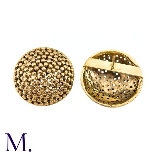 69 - NO RESERVE - A Pair of Large Textured Gold Earrings

The large circular earrings are patterned with ... 