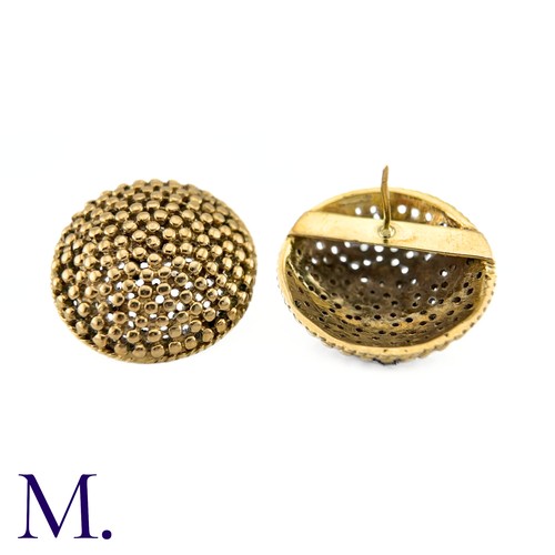 69 - NO RESERVE - A Pair of Large Textured Gold Earrings

The large circular earrings are patterned with ... 