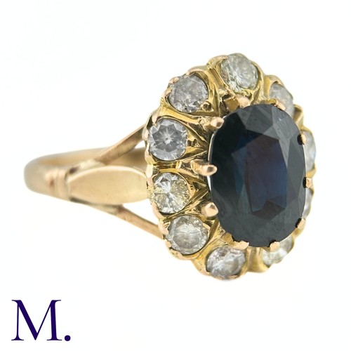 79 - A Sapphire and Diamond Cluster Ring

The 18ct yellow gold ring is set with a 1.6ct oval cut sapphire... 