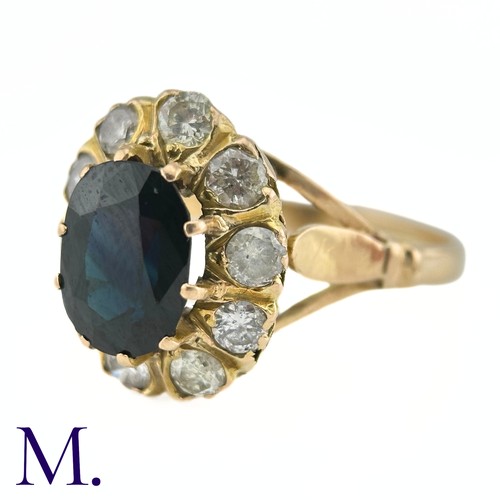 79 - A Sapphire and Diamond Cluster Ring

The 18ct yellow gold ring is set with a 1.6ct oval cut sapphire... 