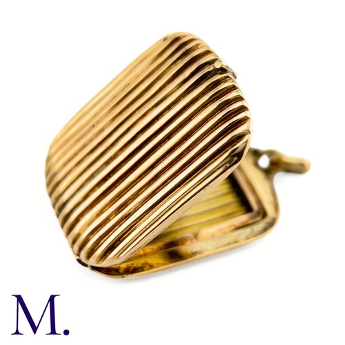 16 - An Antique Fluted Gold Locket

The 9ct yellow gold rectangular locket has a pleasant ridged design 
... 