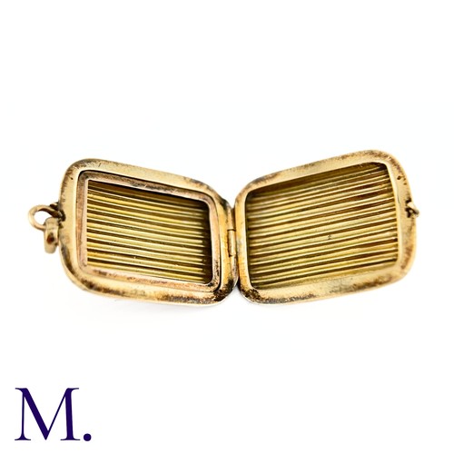 16 - An Antique Fluted Gold Locket

The 9ct yellow gold rectangular locket has a pleasant ridged design 
... 