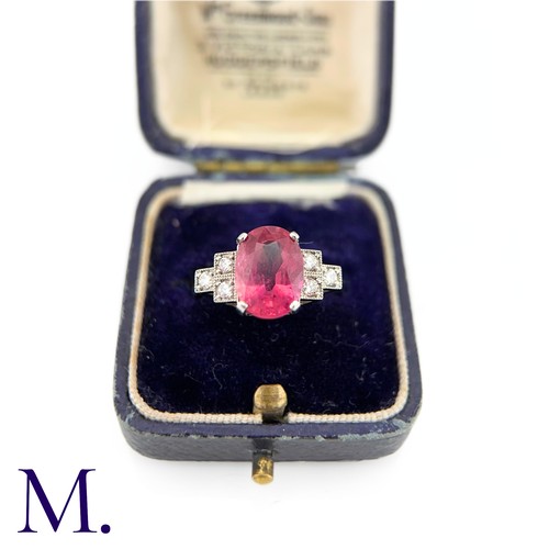 59 - A Ruby and Diamond Ring

The 18ct white gold ring is set with a bright pink ruby of approximately 3.... 