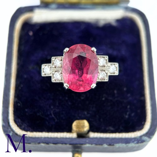 59 - A Ruby and Diamond Ring

The 18ct white gold ring is set with a bright pink ruby of approximately 3.... 