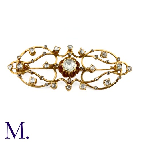 52 - A Rose Diamond Openwork Brooch

The openwork brooch is set with rose diamonds, the centre of which i... 