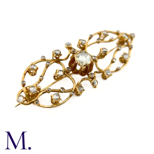 52 - A Rose Diamond Openwork Brooch

The openwork brooch is set with rose diamonds, the centre of which i... 