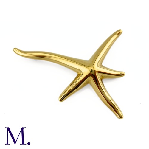 100 - A Starfish Brooch by Tiffany & Co.

The 18ct yellow gold brooch in the form of a starfish is by Elsa... 