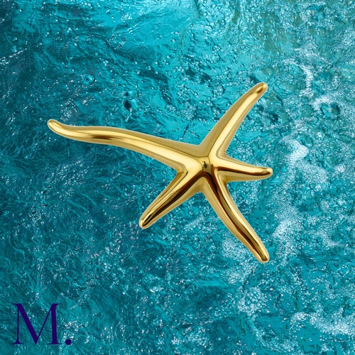 100 - A Starfish Brooch by Tiffany & Co.

The 18ct yellow gold brooch in the form of a starfish is by Elsa... 