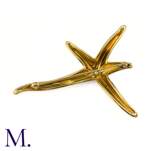 100 - A Starfish Brooch by Tiffany & Co.

The 18ct yellow gold brooch in the form of a starfish is by Elsa... 