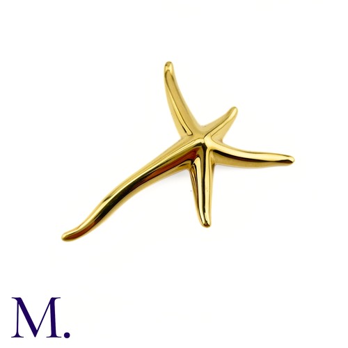 100 - A Starfish Brooch by Tiffany & Co.

The 18ct yellow gold brooch in the form of a starfish is by Elsa... 