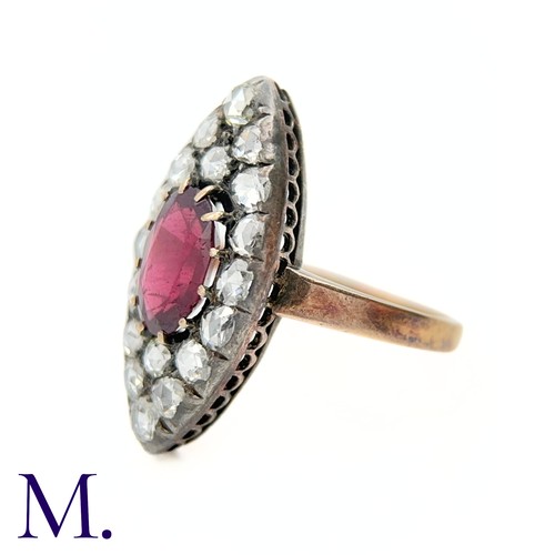 14 - An Antique Garnet and Rose Diamond Marquise Ring

The marquise-shaped ring is set with a deep burgun... 